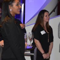 Alumni listening to the Haas's speak at the Chicago Alumni Reception